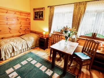 Фото номера Стандартный двухместный номер с 1 кроватью Отель Hotel Dworek Wapionka г. Гужно 5
