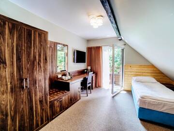 Фото номера Двухместный номер «Комфорт» с 1 кроватью Отель Hotel Dworek Wapionka г. Гужно 5